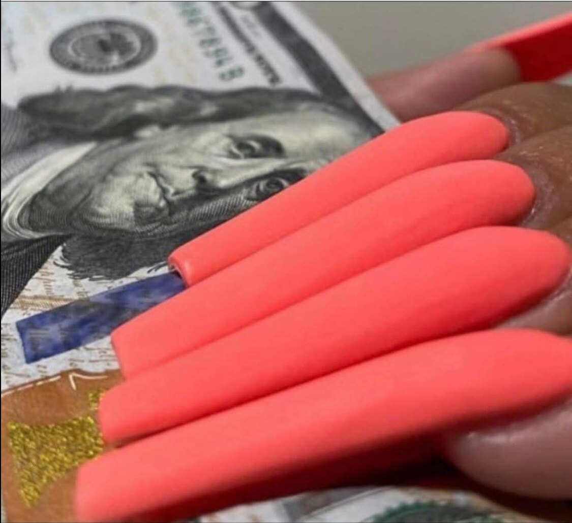 Long coral acrylic set with a matte finish